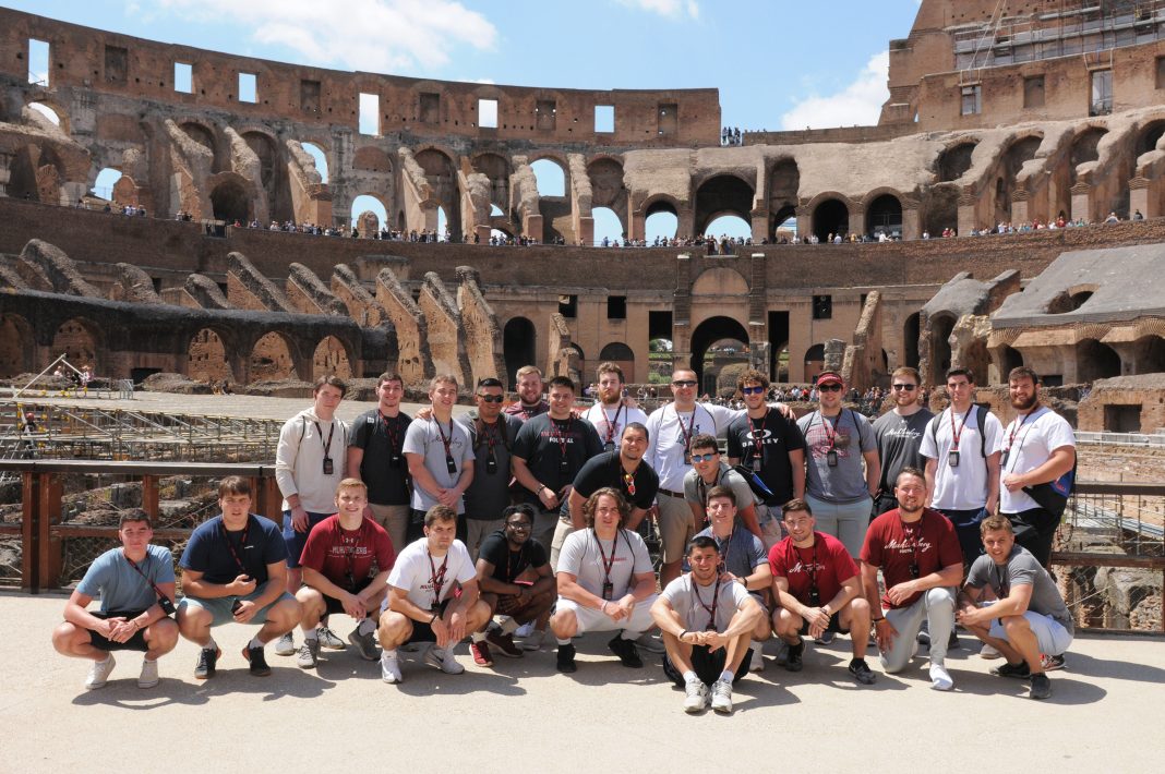 Muhlenberg Football pose for a picture in the Colosseum