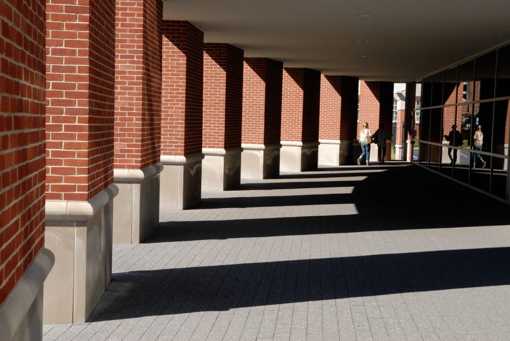An image of the columns of the Life Sports Center, leading to the entrance to the Counseling Center.