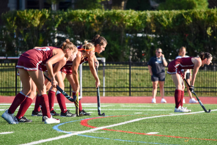 Photo of field hockey team. Photo Credit: Kira Bretsky