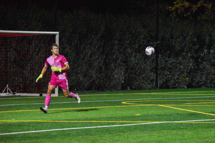 Ben Mulford '26 defends the Muhlenberg goal at a home game against Johns Hopkins on Sept. 20. Photo by Photo Editor Kira Bretsky '27.