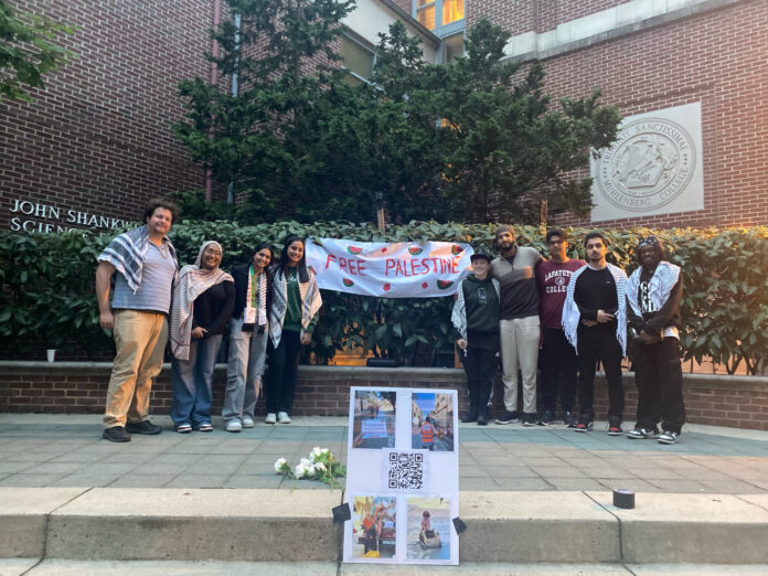 Organizing members of the vigil for Palestine on the stage in Parents Plaza. Photo courtesy of Shajnin Howlader.